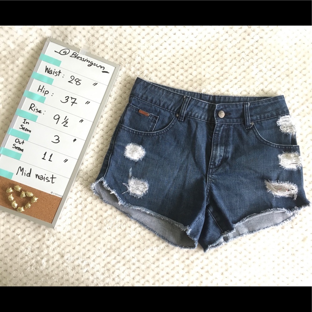 Jean shorts size 28 with ripped in front